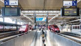 Two high-speed trains enter a train station in Brussels, Belgium. | Olrat | Dreamstime.com