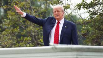President Donald Trump waves toward reporters at the White House | Sipa USA/Newscom