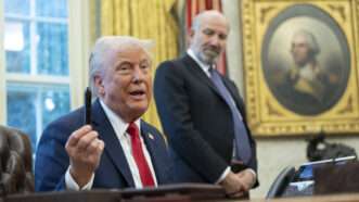 Trump uses a pen as a prop while signing executive orders in the Oval Office of the White House | Chris Kleponis - Pool via CNP/Newscom