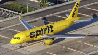Photo of a Spirit Airlines airplane on a runway | imageBROKER/Markus Mainka/Newscom