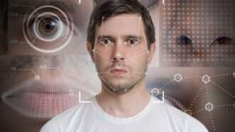 A facial recognition program analyzes a man's face. | Vchalup | Dreamstime.com