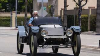 Jay Leno drives a classic car on the streets of Los Angeles. | gotpap/starmaxinc.com/Newscom