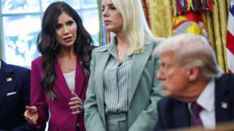 Pam Bondi stands in the Oval Office in between Kristi Noem and Trump | Samuel Corum/UPI/Newscom