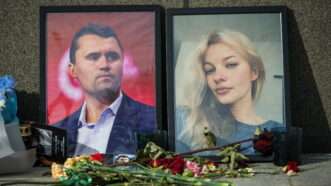 Flowers laid by portraits of Charlie Kirk and Iryna Zarutska | Yevgeny Messman/ZUMAPRESS/Newscom