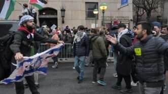 2 campus protesters clashing at Columbia University | Jimin Kim/ZUMAPRESS/Newscom