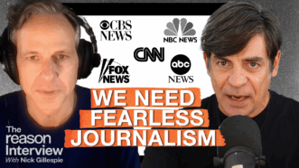 Jake Tapper and Nick Gillespie appear side by side. Behind them are logos for CBS News, NBC News, CNN, Fox News, and ABC News. Large text across the center reads “WE NEED FEARLESS JOURNALISM.” | Illustration: Eddie Marshall