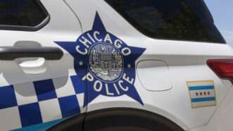 Chicago Police Department badge decal on the back of a police SUV. | Jonathan Weiss | Dreamstime.com