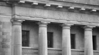 Columns on the front of a courthouse. | Jimmy Lopes | Dreamstime.com