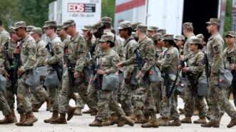 Members of the Texas National Guard assemble in Elwood, Illinois, at the Army Reserve Training Center in the southwest suburb of Chicago. |  Brian Cassella/TNS/Newscom