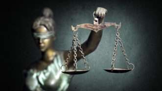 Lady Justice statue, holding scales, with a blindfold over her eyes. | Piatroderbrado | Dreamstime.com