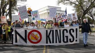 Protesters in Washington, D.C., hold up a banner that says "No Kings!" | Aashish Kiphayet/Sipa USA/Newscom