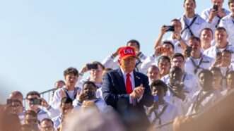 President Trump with U.S. military members | Tom Hudson/Sipa USA/Newscom
