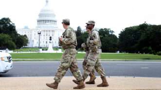 Three men in military uniforms walk past the U.S. Capitol | Photo: Washington, D.C., October 2, 2025; IMAGO/Gent Shkullaku/Alamy