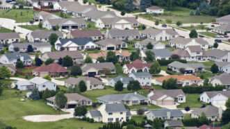 Aerial view of a neighborhood of suburban single-family homes | ID 14814407 ©  Wisconsinart | Dreamstime.com