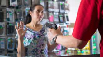 Man tries to rob store | ID 31522223 © Jovanmandic | Dreamstime.com