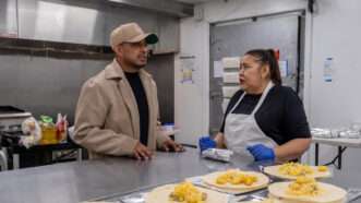 A man and a woman stand in a professional kitchen | Photo: Alejandro Flores-Muñoz; Eli Imadali for The Wall Street Journal