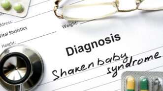 A sheet of paper reading 'Diagnosis shaken baby syndrome' | DPST/Newscom