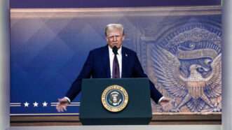 Donald Trump standing at a lectern with the presidential seal | Peng Ziyang / Xinhua News Agency/Newscom