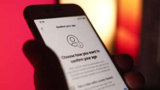 Phone with an age verification message | Str/ZUMAPRESS/Newscom