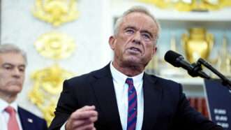 RFK Jr. speaks behind a podium | Aaron Schwartz - Pool via CNP/ZUMAPRESS/Newscom
