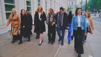 Cherwitz, Daedone, and supporters on the way to court in June | Nicole Daedone/Facebook