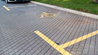 Disabled parking bay | ID 110823852 ©  Zoran Milisavljevic | Dreamstime.com