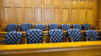 Empty jury box | ID 126903992 ©  Wisconsinart | Dreamstime.com