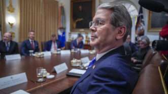 Secretary of the Treasury Scott Bessent listens as US President Donald J Trump holds a meeting with his Cabinet in the Cabinet Room of the White House in Washington, DC, USA, on Tuesday, December 2, 2025. | Yuri Gripas - Pool via CNP/CNP / Polaris/Newscom
