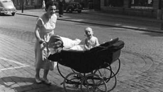A woman is pictured pushing a stroller in the 1950s |  imageBROKER/Sjoberg/Newscom