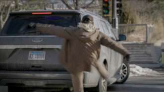 Alex Pretti kicking a federal agent's car | NBC News