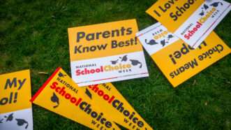 Signs that say "Parents know best! National School choice week" | Travis Long/TNS/Newscom