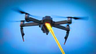 Drone with a laser being pointed | Photo: Vladvitek/Dreamstime.com