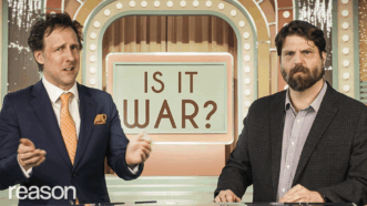 Two men standing on a TV set for a game show called Is It War | Adani Samat