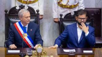 José Antonio Kast sits beside Gabriel Boric during the swearing-in ceremony. | Jesús Martínez/Sipa USA/Newscom
