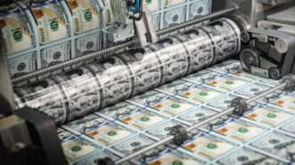 Printing money | Envato