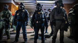 Department of Homeland Security officers | Credit: Benjamin Hanson/ZUMAPRESS/Newscom