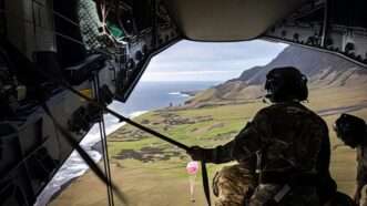 A British medical team air drops onto a remote island | Photo: Tristan da Cunha Government