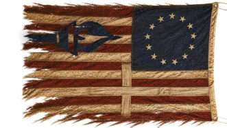 An illustration of an early American flag with a torch and a cross | Illustration: Joanna Andreason; Source images: iStock
