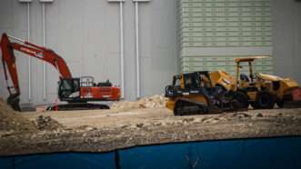 Construction equipment sitting on a data center construction site | Carlos Kosienski/Sipa USA/Newscom