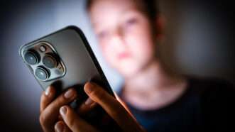 teen on phone | Thomas Trutschel/picture alliance / photothek.de/Newscom