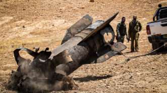 Israeli Border Police removing the remains of an Iranian ballistic missile shot down near Jericho, West Bank, on June 8, 2026. | Jim Hollander/UPI/Newscom