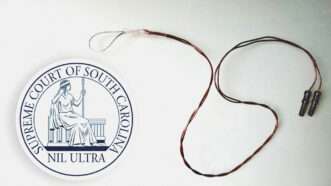the seal of the South Carolina Supreme Court next to a photo of a penile plethysmograph | South Carolina Supreme Court/Wikipedia/Wikimedia Commons