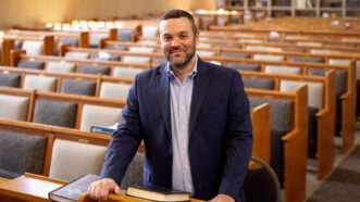 Daniel Grand stands in the middle of a synagogue. | Alliance Defending Freedom