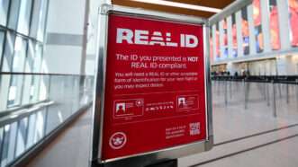 REAL ID sign at an airport checkpoint | Anthony Behar/Sipa USA/Newscom