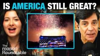 Reem Ibrahim appears on the left. Nick Gillespie appears on the right. The center square has an image of fireworks going off above the National Mall in Washington D.C. during the July 4th celebration. Bold text across the top of the screen reads "IS AMERICA STILL GREAT?" | Illustration: Lex Villena