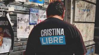 An Argentinian man wearing a "Cristina Libre" shirt | Credit: Reem Ibrahim
