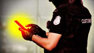 A law enforcement officer holding a phone | Midjourney