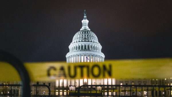 U.S. Capitol Building with caution tape in front of it | Photo by Andy Feliciotti on Unsplash