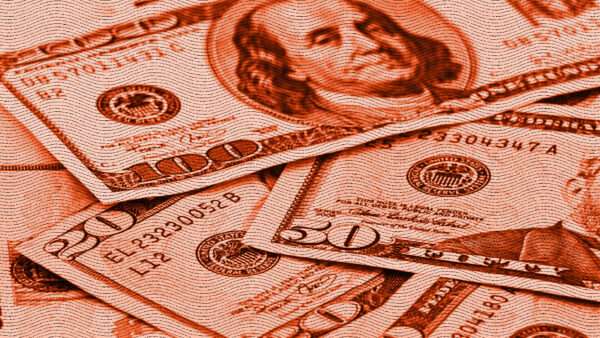 US Dollars tinted red | Photo: PedaltotheStock/Envato