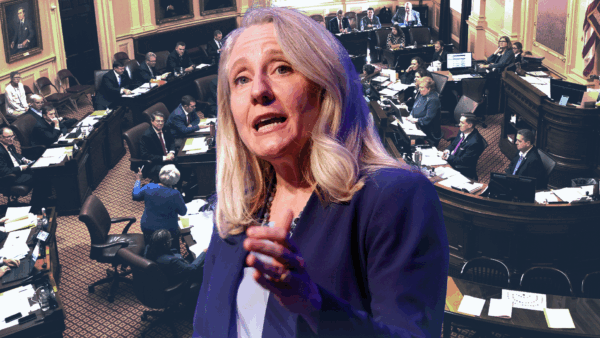 Abigail Spanberger in the foreground and Virginia lawmakers in the background | Schuerman/TNS/Newscom/Peter Casey